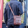 mens crossbody bag with space for your mobile phone, e-reader, notepad, and charging cords.